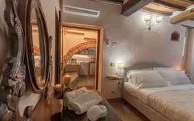 Schlafzimmer- Palazzina 1 Borgo Gaggioleto